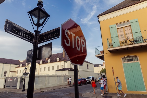 Historic buildings and street signs in the French Quarter, New Orleans, Louisiana.